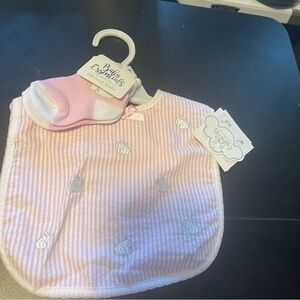Baby Essentials. Bib and socks.  New